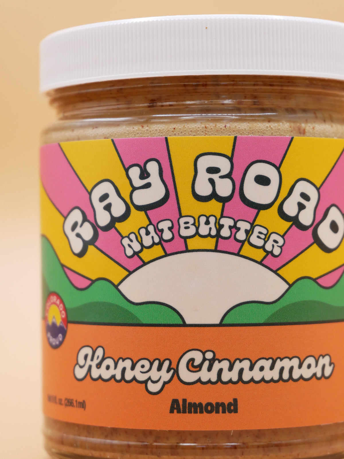 up close jar of ray road honey cinnamon nut butter