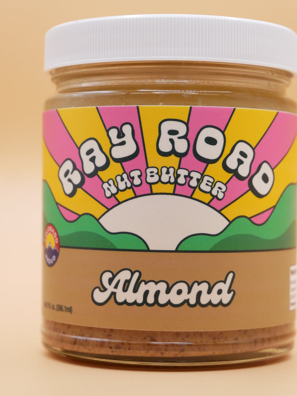 close up of a jar of ray road nut butter almond butter
